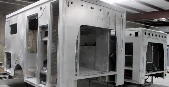 Front curbside corner view of Muskogee #2655 in paint and body prep.