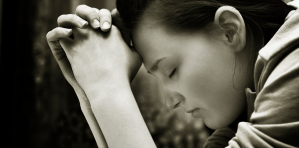 Kneeling in prayer
