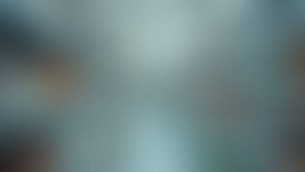 an aisle in a pharmacy with medications lining the shelves