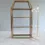 Thumbnail: Handcrafted 3-Grid Clear Glass Jewelry Display Rack with Golden Brass Frame