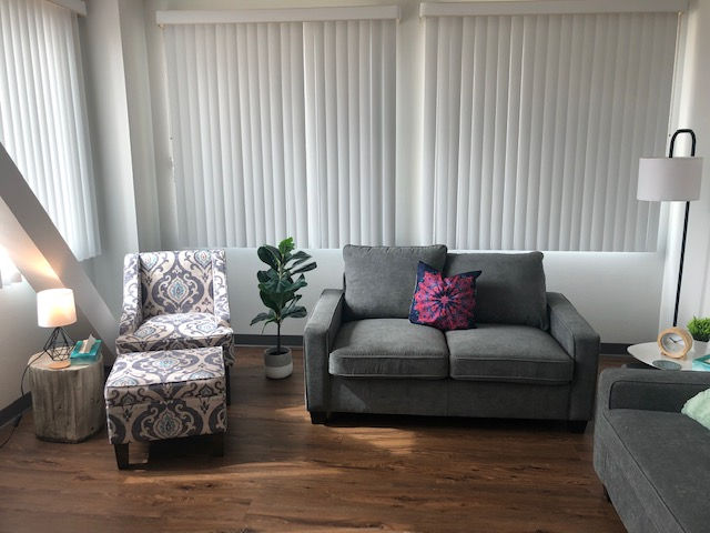 High angle view of a cozy therapy room with comfortable chairs and soft lighting