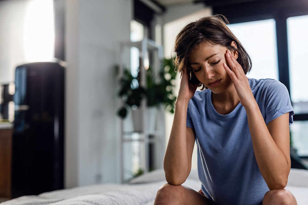 A mother experiencing stress and fatigue from parental burnout