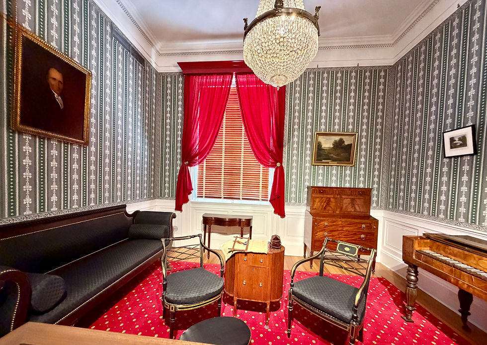 The Hall contains 31 period rooms each furnished by a state DAR organization, depicting parlors, kitchens, dining rooms, bedrooms, boardrooms, and taverns, mostly from the 1800s. This Washington D.C. period room recreates a parlor from 1810, D.C.’s early days. (F. Leone, Mar. 2026)