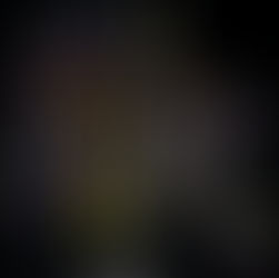 A top-down architectural blueprint of a commercial kitchen layout, featuring various work zones and equipment. The plan shows the positions of a walk-in refrigerator, sinks, prep stations, a bar prep station, a rotisserie for 24 birds, and a mop sink. The dimensions and labels for different areas and equipment are clearly marked. The drawing is on a black background with colored lines for different elements.