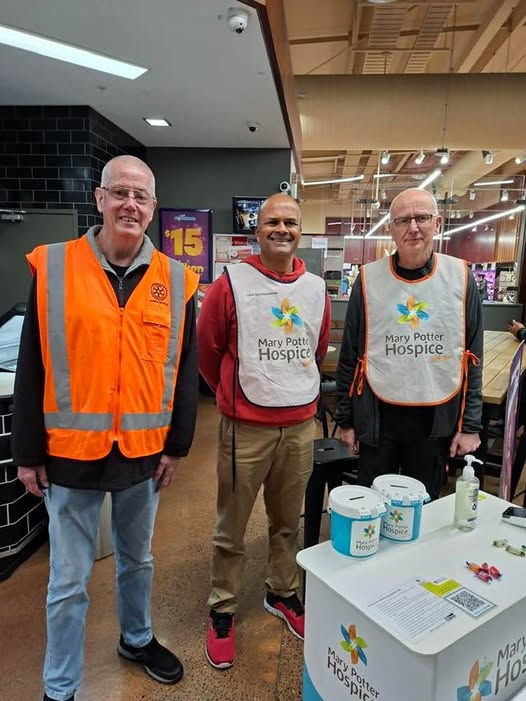 Mary Potter area co-ordinator Pravind Sing (centre) meets with a couple of Johnsonville Rotary volunteers at New World Supermarket in Newlands