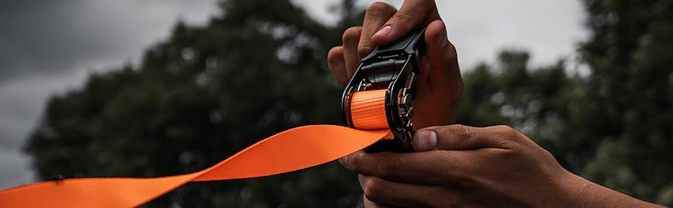 Orange measuring tape being used with a black tape holder