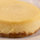 Thumbnail: Delicious cheesecake on a white plate, ready for serving and enjoying.