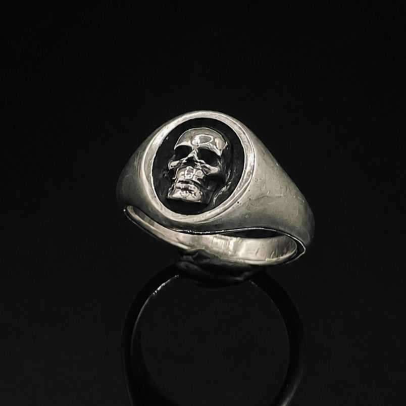 Thumbnail: Sterling Silver Skull Signet Ring Angled View