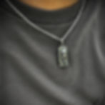 Sterling Silver Tombstone Pendant on a man