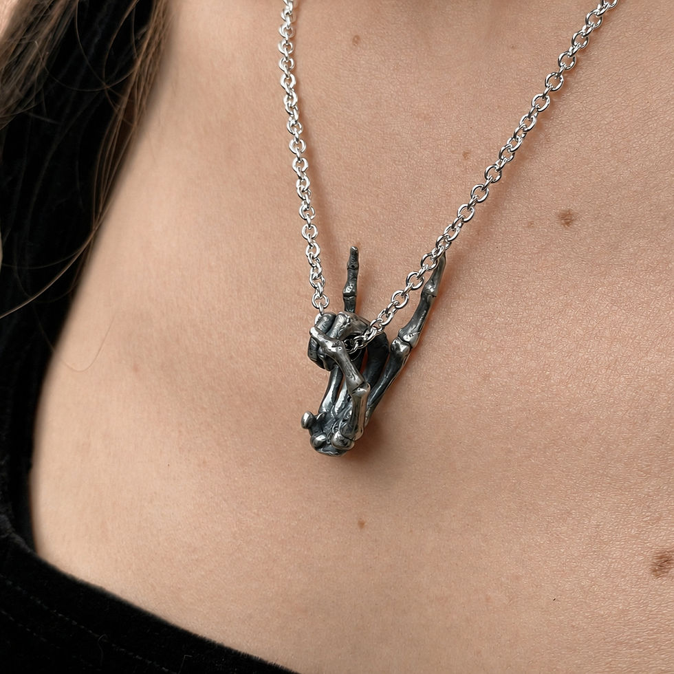 Thumbnail: Sterling Silver Horns Up Pendant close up on a woman
