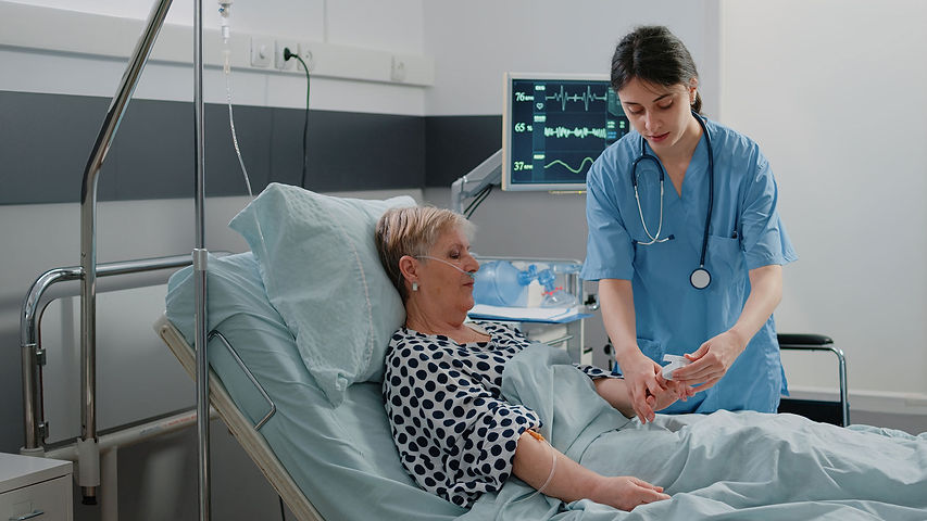 medical-assistant-putting-oximeter-on-finger-of-ag-2021-10-26-01-24-12-utc.jpg