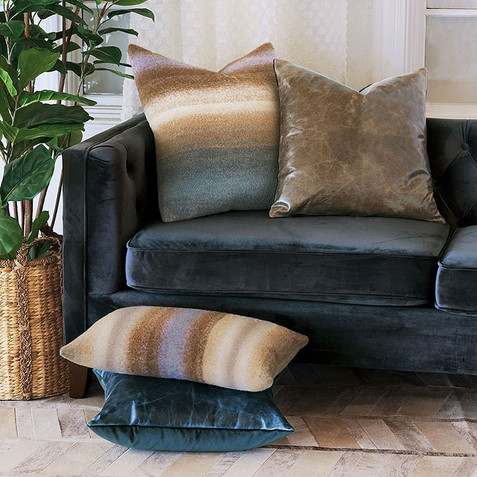 Decorative pillows and fabrics in December, including 100% wool mohair, rustic embroidery, and woven neutrals.