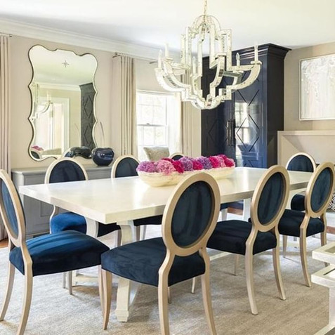 Blue Fabric Gigi Side Chairs compliment this spacious dining room.