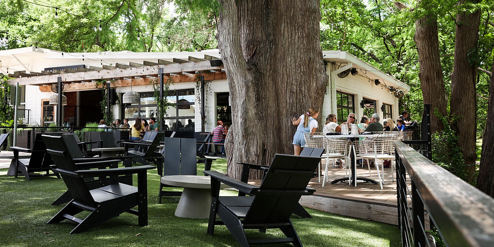 Outdoor seating and community gathering in Wimberley, TX — the perfect backdrop for September events, live music, and Hill Country charm.