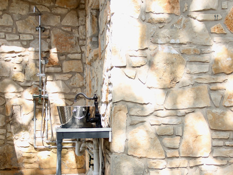 The Lazy Lavender House Vacation Rental outdoor shower in Wimberley, Texas.