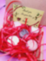 Open package of Tee Pow cosmetics, showing the Body Butter and Emulsified Sugar Scrub samples neatly arranged inside the box.