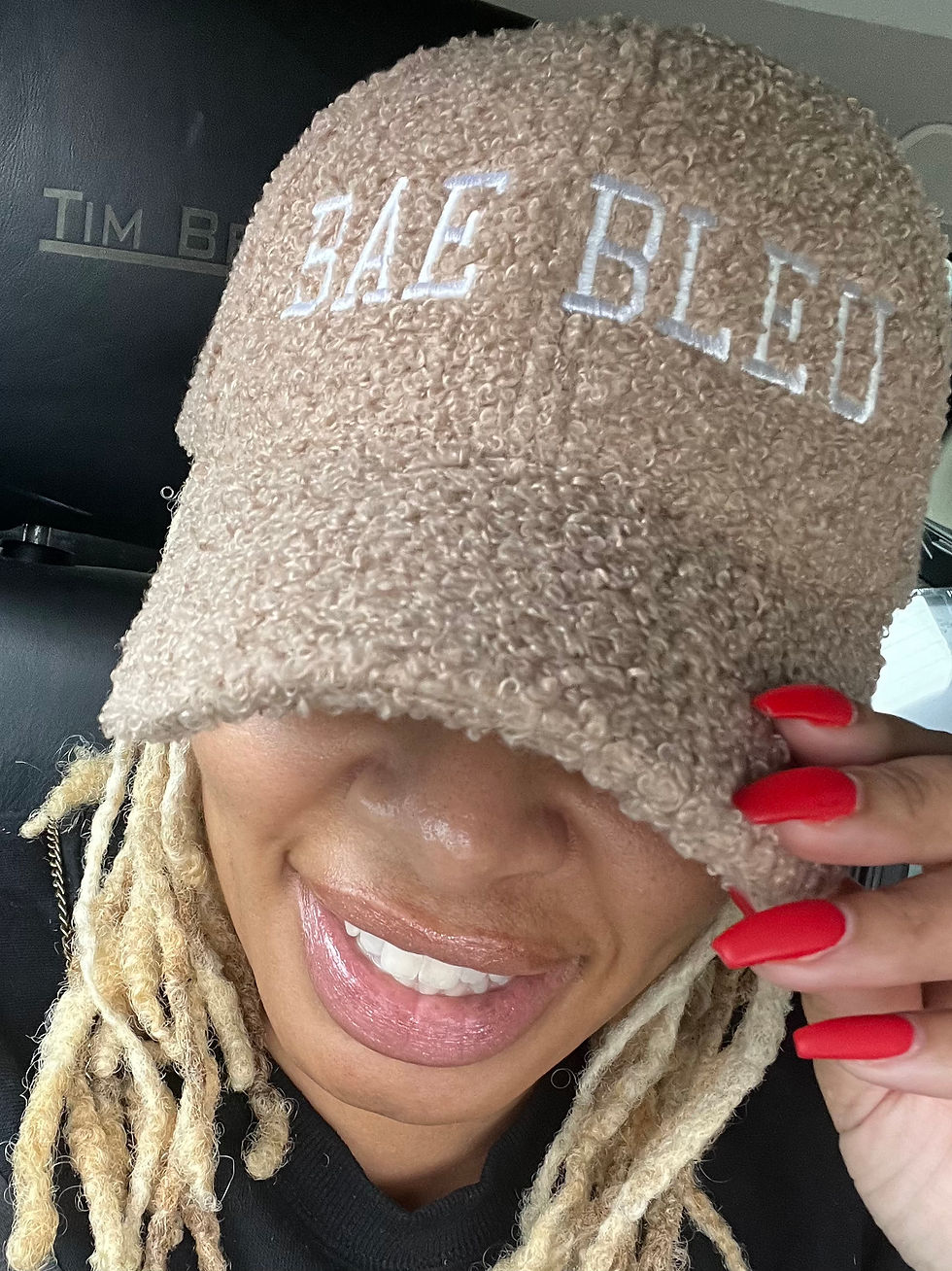 Beige Teddy Cap by Bae Bleu® featuring plush teddy texture and white embroidered lettering.