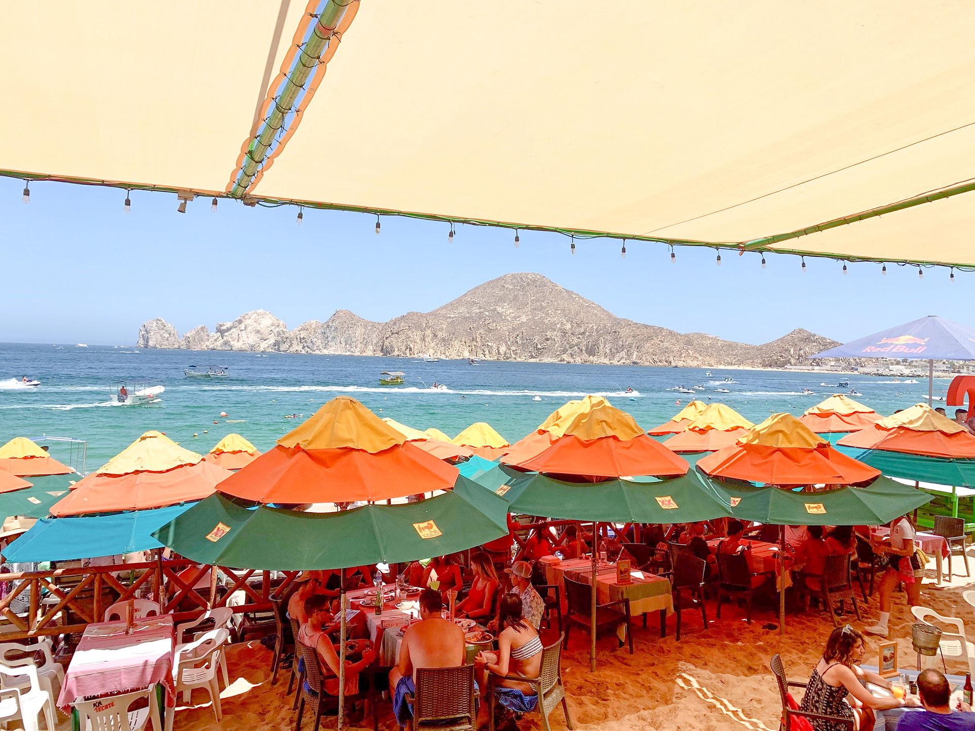 Visiting Medano Beach is perfect during any type of trip to Cabo, & here are some of Rich & Kitch's favorite things to do!  Bagatelle Los Cabos is a fun beach club to spend the day on Medano Beach.  The Office on the Beach has some of the best beach food & an impressive margarita list. Mango Deck: If you’re looking for a party, Mango Deck is the place for you. It’s touristy & they have some interesting contests, but it always makes for a rowdy time! They also have a rooftop which is more laid back & has amazing views! Tabasco Beach Bar is low-key bar, but offers reasonably priced drinks (compared to other bars on Medano Beach) & they have beach chairs you can lounge at during the day.  Sandbar Los Cabos is another low-key beach bar. You can also schedule affordable massages which are offered on their rooftop! 