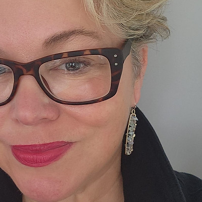 tina in glasses no filter.jpg