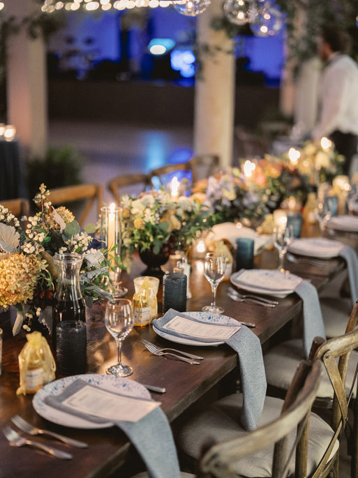 Greek wedding table décor at The Circuit Center in Pittsburgh with gold accents and candles.