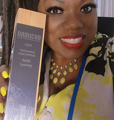 Katreva with trophy at 2024 NAMI Con_edited.jpg