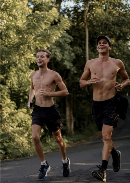 Two men running outside