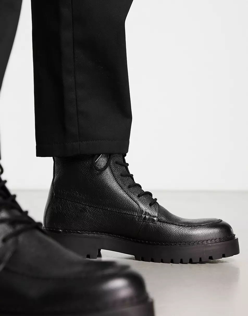 Schuh Draco Chunky Lace-up boots in black leather