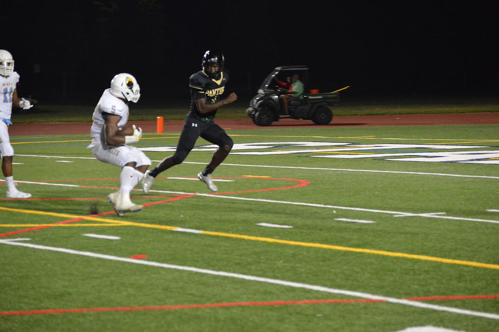 #5 Antonio Grier heads to endzone after int