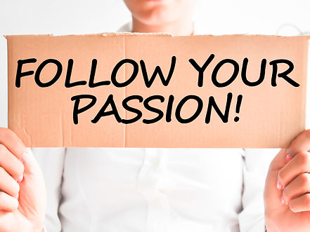 Follow your passion text hold by businesswoman_edited.jpg