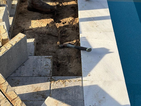 How Do You Fix Loose or Wobbly Pavers Around Your Pool Deck?