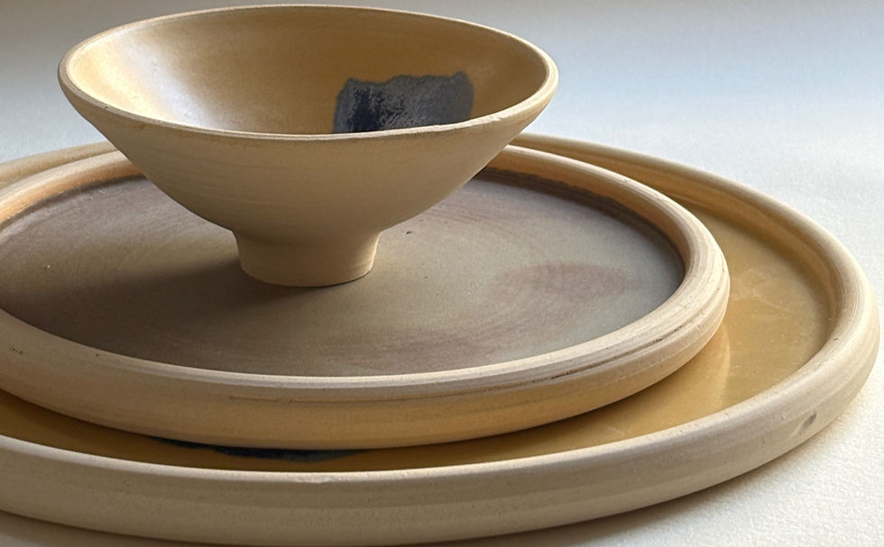 Handmade ceramic plates and bowl made at Studio Marvila in Lisbon