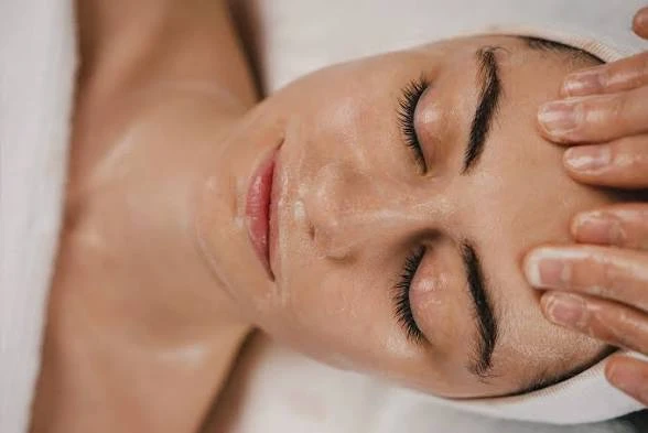 Woman relaxing during a wellness journey at FL Aesthetics Clinic