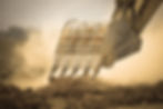 Excavator working with red soil and dusty.jpg