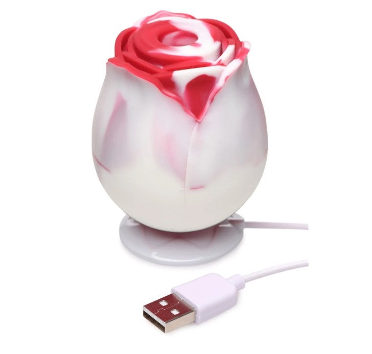 swirl coloured clit sucker rose vibrator on charger