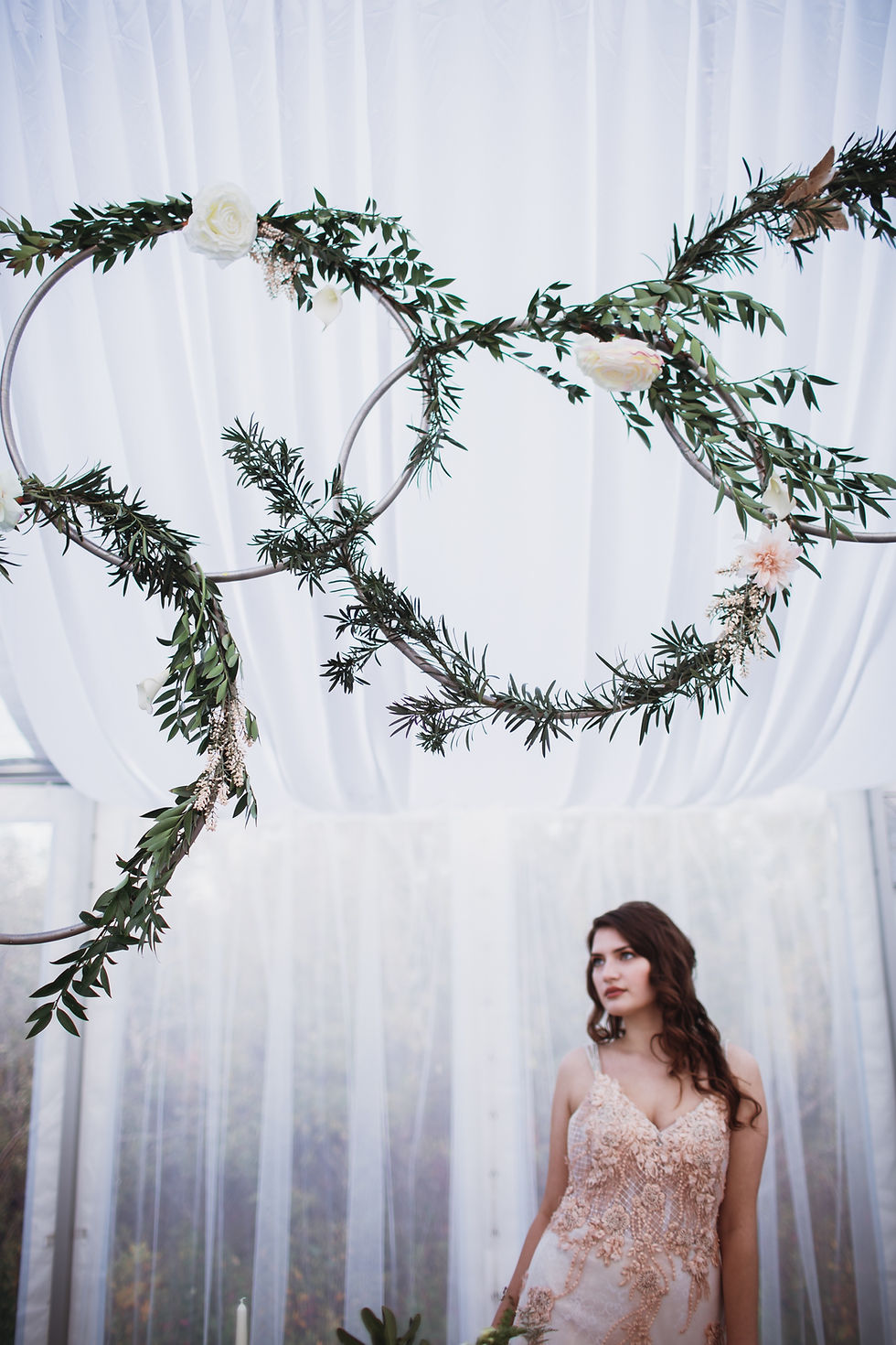 Wedding hoops above head table.