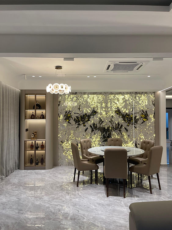 Dining area with illuminated feature wall at Eco Ardence Aeres
