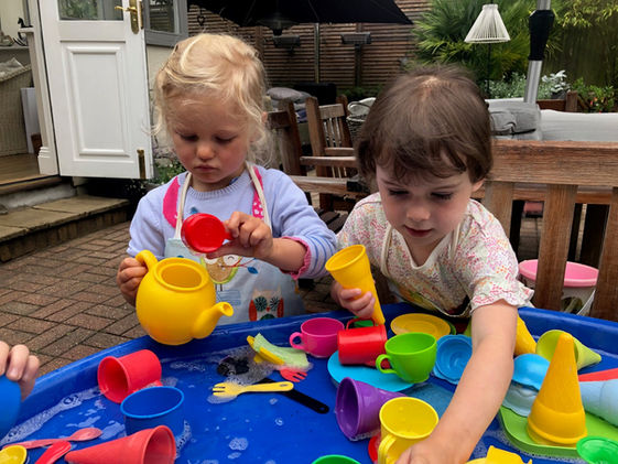 waterplay in tough tray.jpg