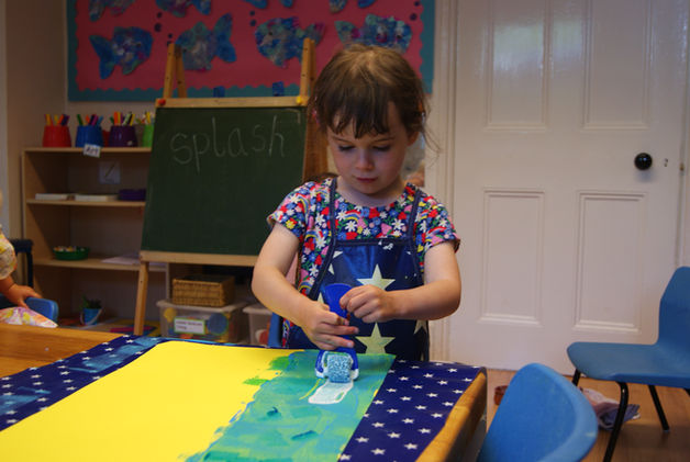 painting the sea with roller.JPG