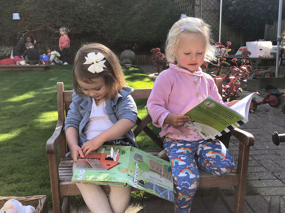 Margot Lemonnie reading in garden.jpg