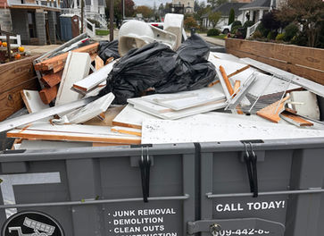 Wreck'N Crew trailer loaded with junk and debris for disposal in Atlantic County, NJ.