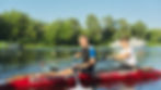 Two teen boys kayaking in Marina Del Rey, enjoying beach fun for teens in Los Angeles