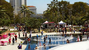 Families enjoying the splash pad and arts corridor atmosphere at Grand Park in Downtown Los Angeles