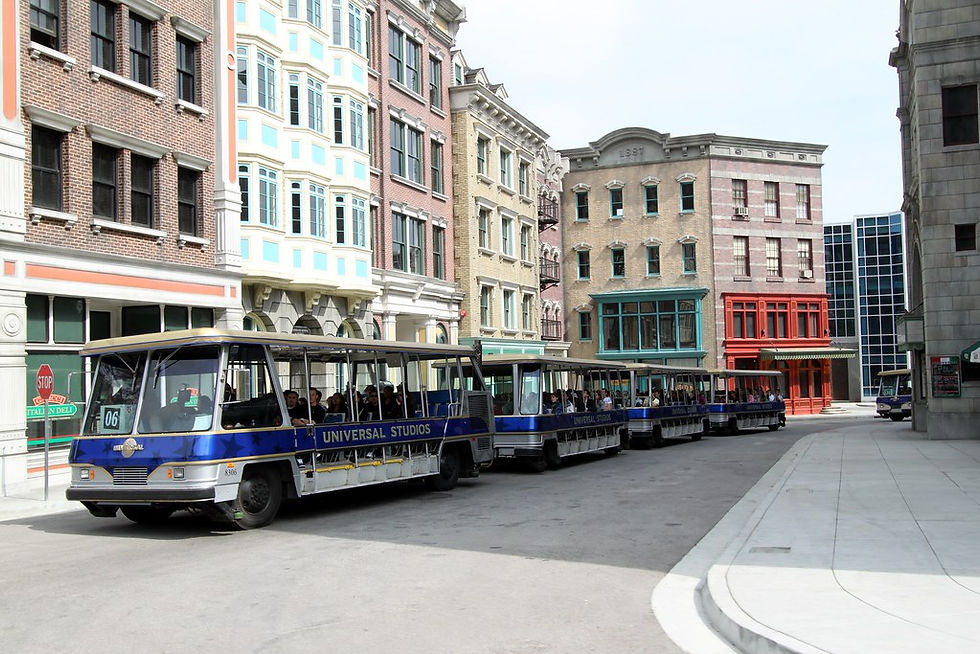 Universal Studios Hollywood Studio Tour trams lined up on a New York City street set on the backlot