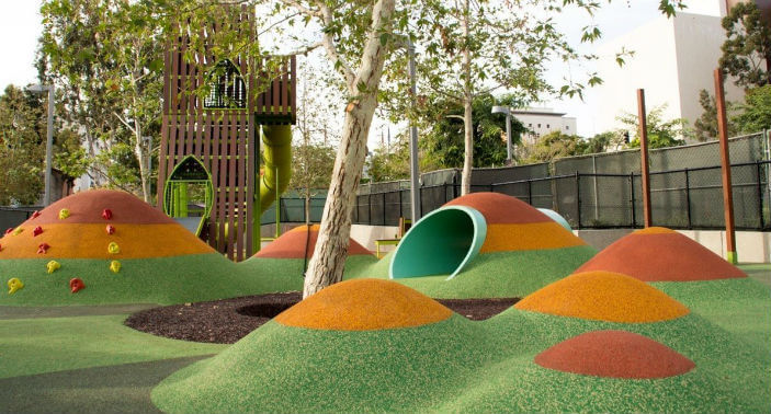 Colorful playground mounds and slide at Grand Park near the Grand Avenue arts corridor