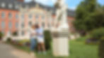 Two women looking at a historic monument during a Rhine River cruise excursion, dressed in stylish comfort.