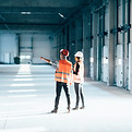 Consultants surveying the inside of an industrial warehouse/flex space in Palm Beach county, Florida