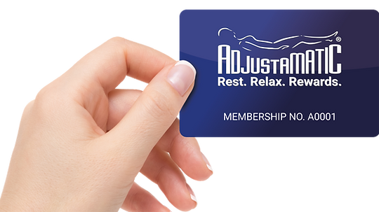Hand holding rewards card.png