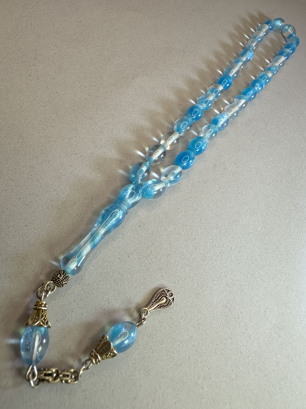 Miniaturbild: Sparkly Blue & Gold Fire Amber Rosary - Shimmering Effect Prayer Beads -Oval cut