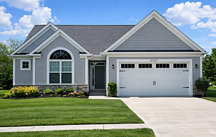 Charming suburban house on a sunny day.png