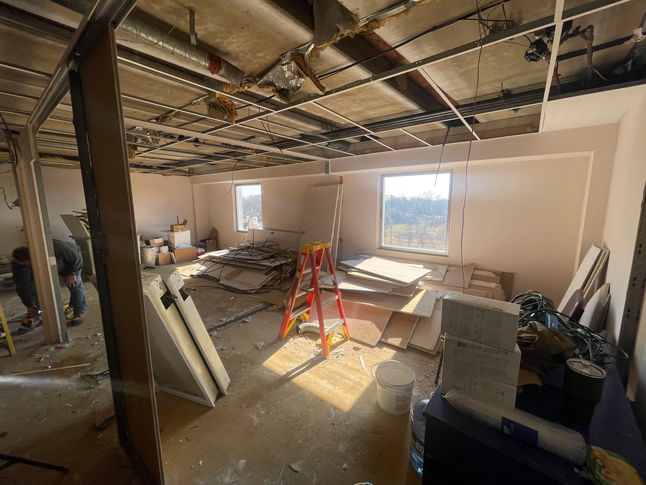 Picture of a gutted space at a pediatrician facility before renovations are done by PRM services.